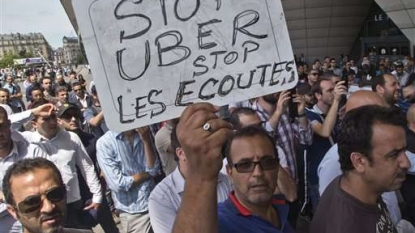 French president wants Uber’s cheapest service shut down; Uber says no