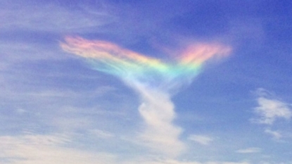 Twisted, rainbow-colored clouds hover over South Carolina