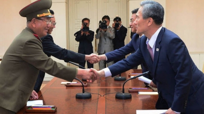 North, South Korea agree to defuse crisis after marathon talks