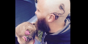 Father’s tattoo tribute to daughter who has two hearing implants goes viral