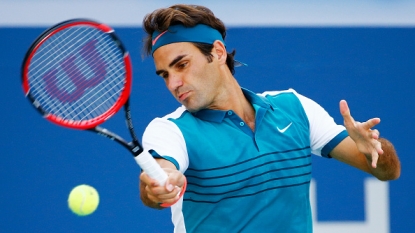 Federer downs Kohlschreiber to make fourth round