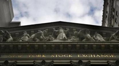 U.S. stocks end bruising quarter on happy note